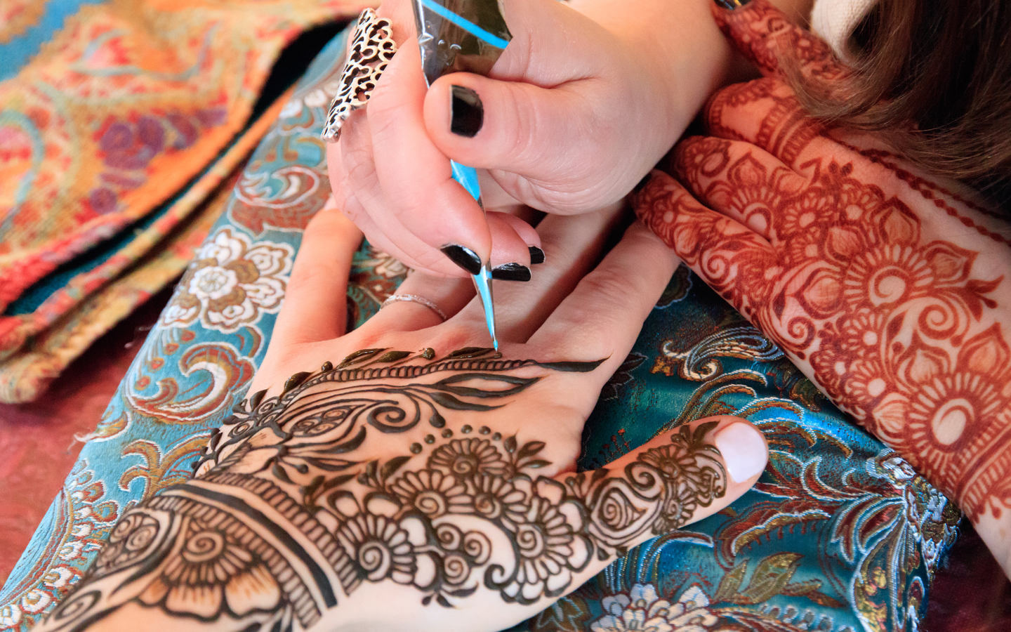 Bridal henna on hands close up